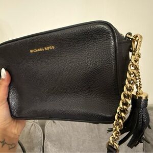 Selling black Michael kors and tory burch bags,both are in perfect condition.